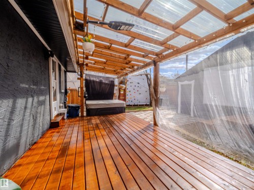 View of wooden terrace - 5911 119 Avenue, Edmonton, AB - Indoor Photo Showing Other Room