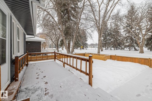 View of snow covered deck - 5911 119 Avenue, Edmonton, AB - Outdoor With Deck Patio Veranda