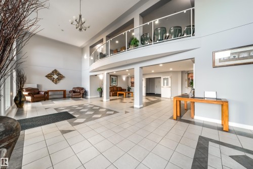 Lobby featuring a high ceiling and recessed lighting - 402 7803 Golf Course Road, Stony Plain, AB - Indoor Photo Showing Other Room