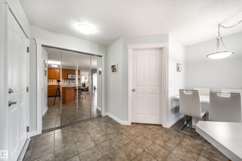 Home office featuring a textured ceiling and baseboards - 402 7803 Golf Course Road, Stony Plain, AB - Indoor Photo Showing Other Room