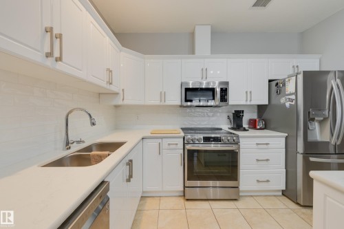 215 1003 Gault Boulevard, Edmonton, AB - Indoor Photo Showing Kitchen With Stainless Steel Kitchen With Double Sink With Upgraded Kitchen