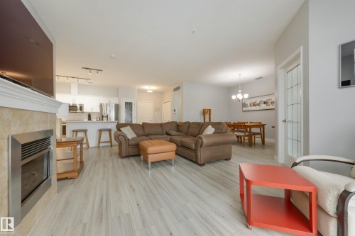 215 1003 Gault Boulevard, Edmonton, AB - Indoor Photo Showing Living Room With Fireplace