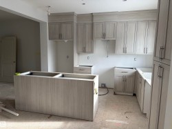 Kitchen featuring a center island - 