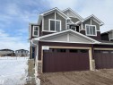 Craftsman inspired home featuring stone siding - 5756 Hawthorn Common, Edmonton, AB  - Outdoor 