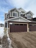 Craftsman house with stone siding and dirt driveway - 5756 Hawthorn Common, Edmonton, AB  - Outdoor 