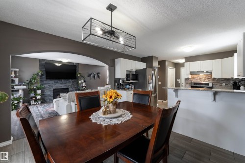 31 Haviland Crescent, St. Albert, AB - Indoor Photo Showing Dining Room With Fireplace