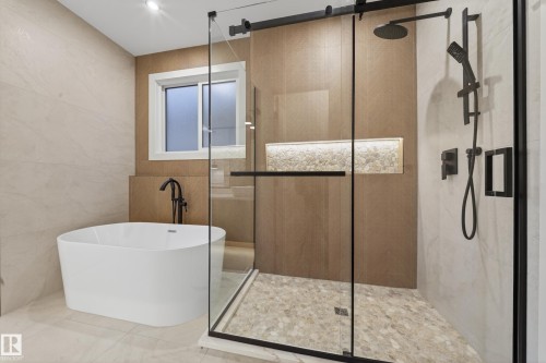 Full bathroom with a soaking tub, tile walls, and a shower stall - 4276 Charles Close, Edmonton, AB - Indoor Photo Showing Bathroom