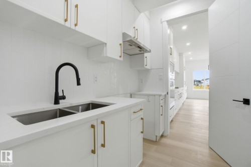 3311 Chernowski Way, Edmonton, AB - Indoor Photo Showing Kitchen With Double Sink With Upgraded Kitchen