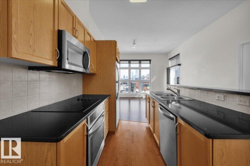 453 10403 122 Street, Edmonton, AB - Indoor Photo Showing Kitchen With Double Sink