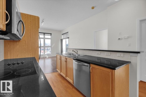 453 10403 122 Street, Edmonton, AB - Indoor Photo Showing Kitchen With Double Sink