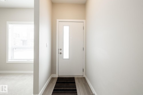 127 2560 Pegasus Boulevard, Edmonton, AB - Indoor Photo Showing Other Room