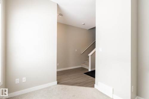 127 2560 Pegasus Boulevard, Edmonton, AB - Indoor Photo Showing Other Room