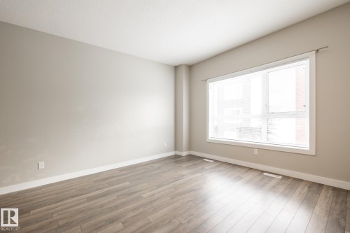 127 2560 Pegasus Boulevard, Edmonton, AB - Indoor Photo Showing Other Room