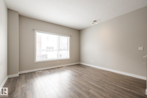127 2560 Pegasus Boulevard, Edmonton, AB - Indoor Photo Showing Other Room