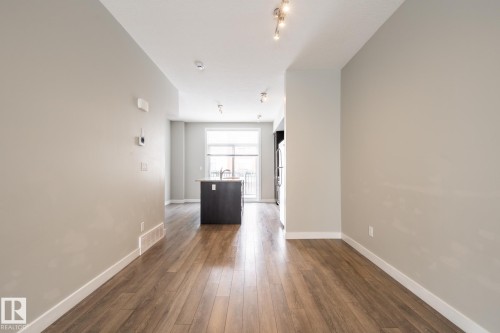127 2560 Pegasus Boulevard, Edmonton, AB - Indoor Photo Showing Other Room