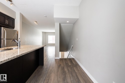 127 2560 Pegasus Boulevard, Edmonton, AB - Indoor Photo Showing Kitchen