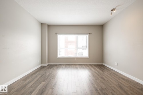 127 2560 Pegasus Boulevard, Edmonton, AB - Indoor Photo Showing Other Room