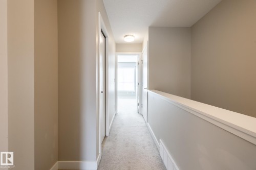 127 2560 Pegasus Boulevard, Edmonton, AB - Indoor Photo Showing Other Room