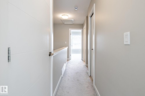 127 2560 Pegasus Boulevard, Edmonton, AB - Indoor Photo Showing Other Room