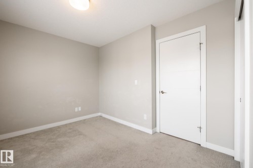 127 2560 Pegasus Boulevard, Edmonton, AB - Indoor Photo Showing Other Room