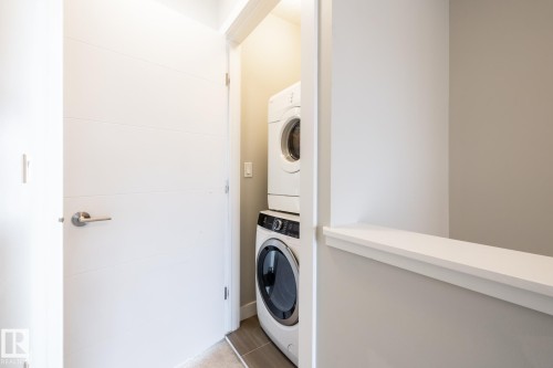127 2560 Pegasus Boulevard, Edmonton, AB - Indoor Photo Showing Laundry Room