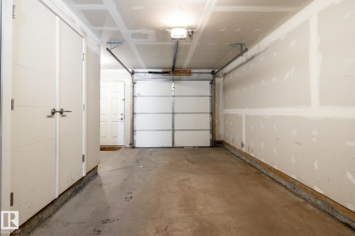 127 2560 Pegasus Boulevard, Edmonton, AB - Indoor Photo Showing Garage
