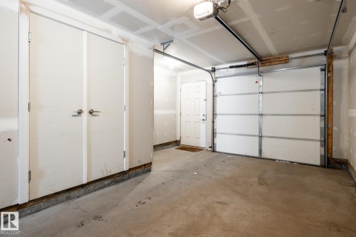 127 2560 Pegasus Boulevard, Edmonton, AB - Indoor Photo Showing Garage