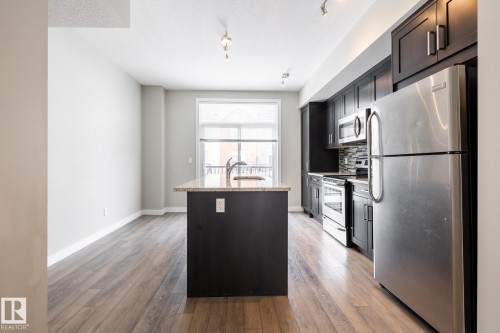 127 2560 Pegasus Boulevard, Edmonton, AB - Indoor Photo Showing Kitchen With Stainless Steel Kitchen
