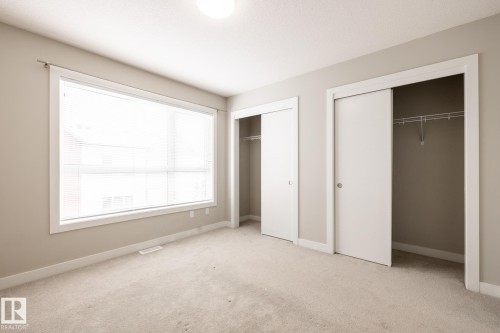 127 2560 Pegasus Boulevard, Edmonton, AB - Indoor Photo Showing Other Room
