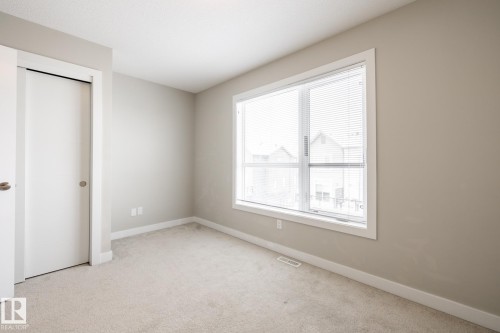 127 2560 Pegasus Boulevard, Edmonton, AB - Indoor Photo Showing Other Room