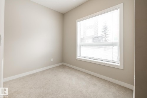 127 2560 Pegasus Boulevard, Edmonton, AB - Indoor Photo Showing Other Room