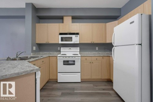 126 4304 139 Avenue, Edmonton, AB - Indoor Photo Showing Kitchen With Double Sink