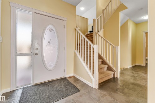 Entryway with stairs and baseboards - 3449 28 Street, Edmonton, AB - Indoor Photo Showing Other Room