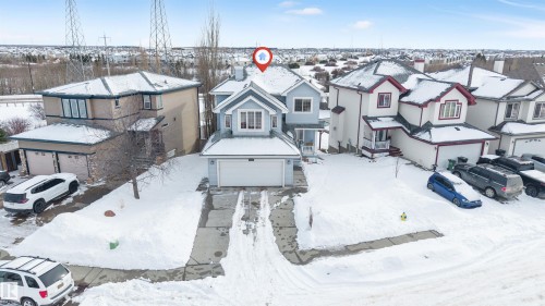 Snowy aerial view with a residential view - 3449 28 Street, Edmonton, AB - Outdoor With Facade