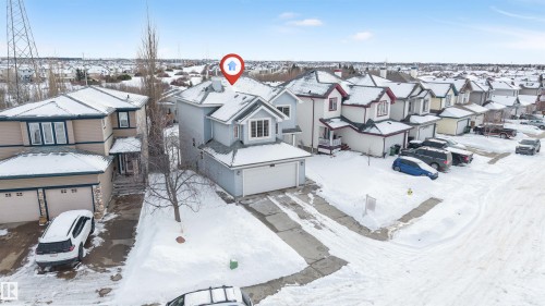 Snowy aerial view featuring a residential view - 3449 28 Street, Edmonton, AB - Outdoor With Facade