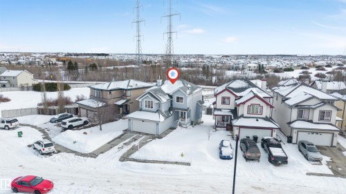 Snowy aerial view featuring a residential view - 3449 28 Street, Edmonton, AB - Outdoor With Facade