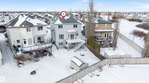 Snowy aerial view with a residential view - 3449 28 Street, Edmonton, AB - Outdoor With Deck Patio Veranda