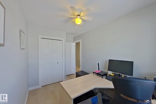 Home office featuring light wood-style floors and a ceiling fan - 121 1 Aberdeen Way, Stony Plain, AB - Indoor Photo Showing Office