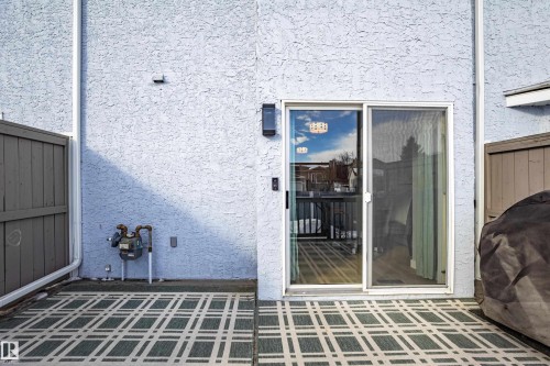View of exterior entry with stucco siding - 121 1 Aberdeen Way, Stony Plain, AB - Outdoor With Exterior