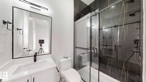 Bathroom with vanity and a shower stall - 1707 18 Street, Edmonton, AB - Indoor Photo Showing Bathroom