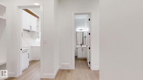 Corridor featuring light wood-style floors - 1707 18 Street, Edmonton, AB - Indoor Photo Showing Other Room