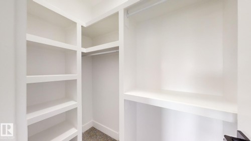 View of walk in closet - 1707 18 Street, Edmonton, AB - Indoor Photo Showing Other Room