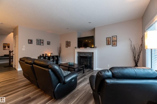 16728 60 Street, Edmonton, AB - Indoor Photo Showing Living Room With Fireplace
