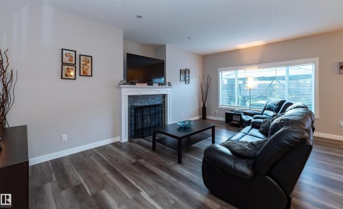 16728 60 Street, Edmonton, AB - Indoor Photo Showing Living Room With Fireplace