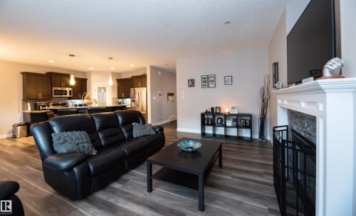 16728 60 Street, Edmonton, AB - Indoor Photo Showing Living Room With Fireplace