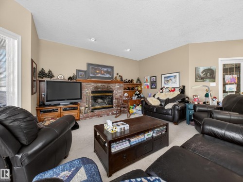 403 Twin Brooks Crescent, Edmonton, AB - Indoor Photo Showing Living Room With Fireplace