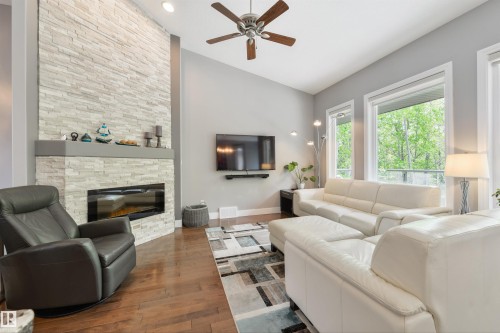 14 Prestige Point(E), Edmonton, AB - Indoor Photo Showing Living Room With Fireplace