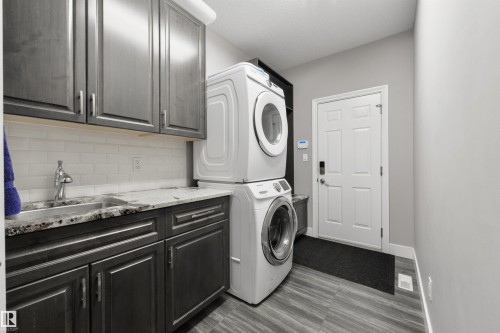 14 Prestige Point(E), Edmonton, AB - Indoor Photo Showing Laundry Room