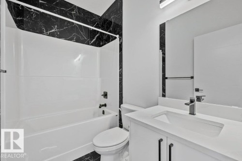 Full bath with vanity and shower / bath combination - Edmonton, AB - Indoor Photo Showing Bathroom