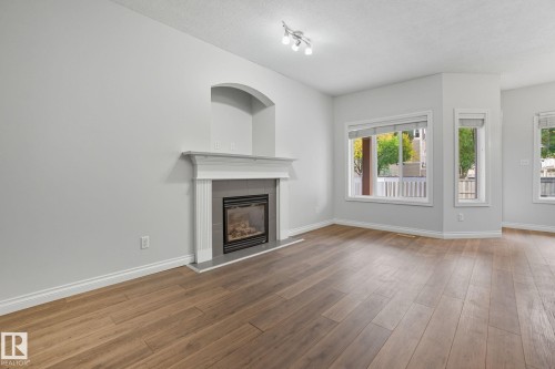 2209 Austin Way, Edmonton, AB - Indoor Photo Showing Living Room With Fireplace